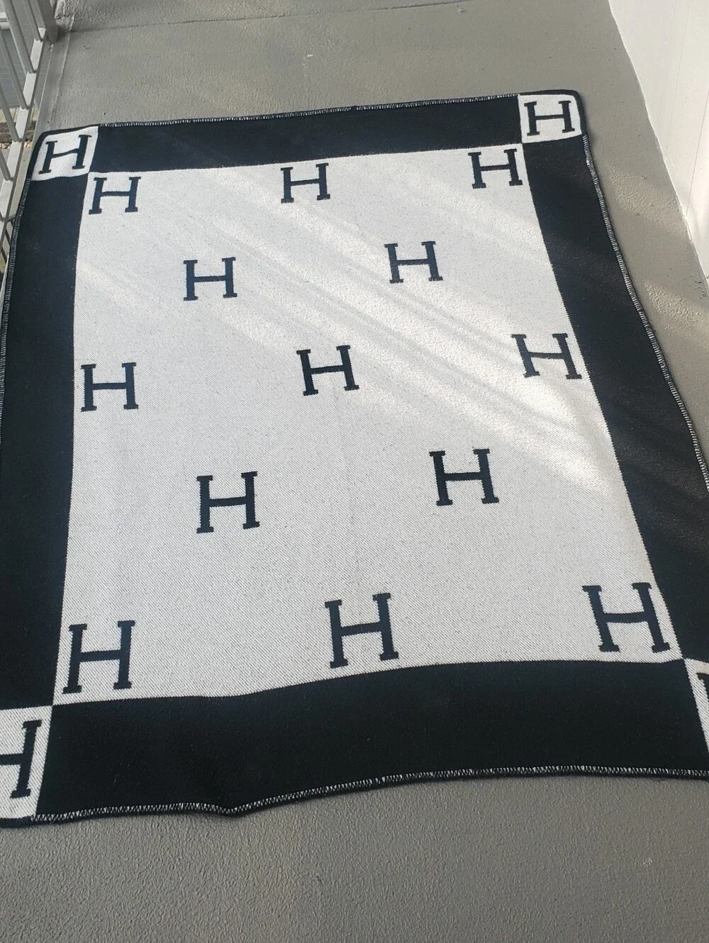 Hermes Avalon III Black and Cream Logo Knit Throw